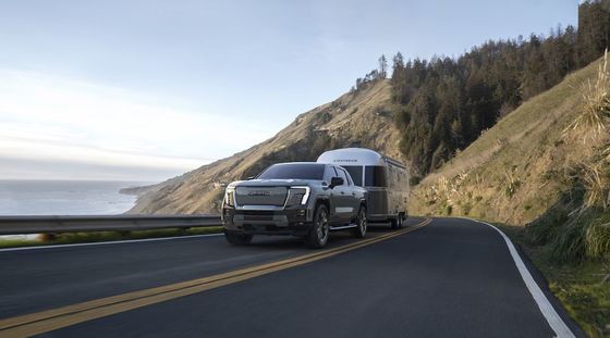GMC Sierra EV dual motor powertrain with 754Ps rated to tow up to 9500 pounds and can haul up to 1300 pounds of payload