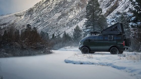 A purpose-built trcuk Canoo pickup w 8 ft bed with ample storage interior